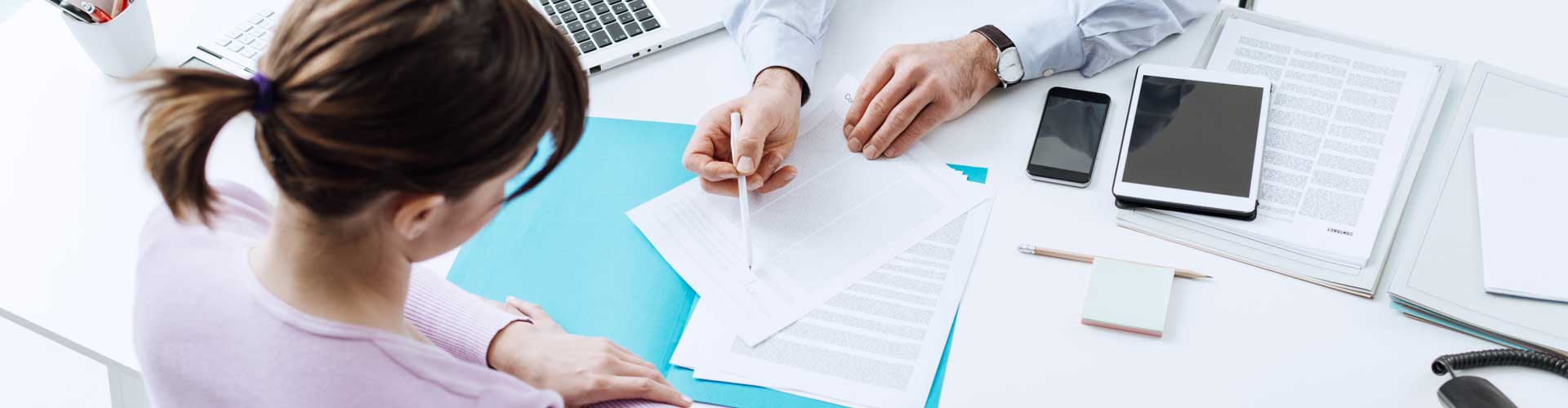 top down view of people at a meeting