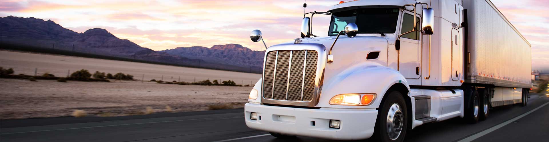 white truck going down freeway