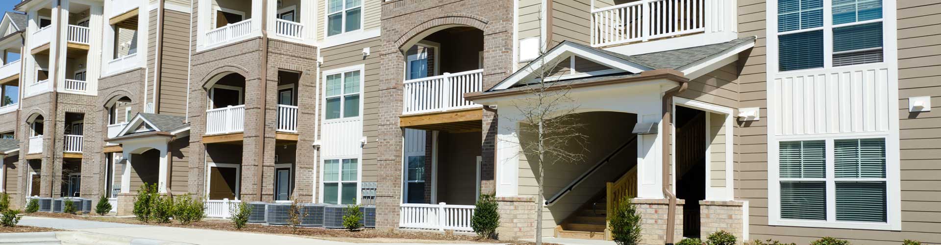 front exterior of a few townhomes